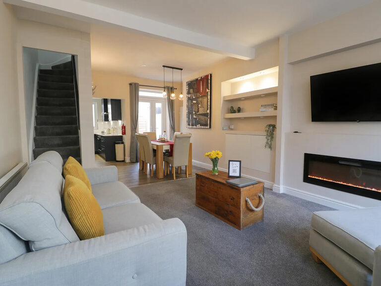 Llandudno Central Townhouse living room looking through to the dining area